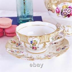 Antique Ridgway foliage shape teacup and saucer set, handpainted flowers