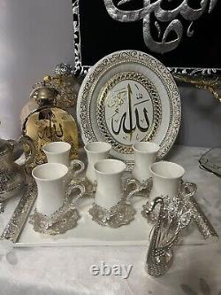 Beautiful gold and silver Turkish cups for coffee set with plate