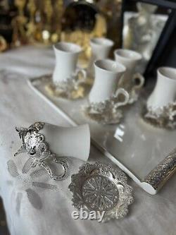 Beautiful gold and silver Turkish cups for coffee set with plate