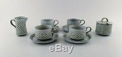 Bing & Grondahl number 305. Set of 4 tea cups with saucers, a jug and sugar bowl