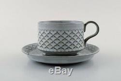 Bing & Grondahl number 305. Set of 4 tea cups with saucers, a jug and sugar bowl