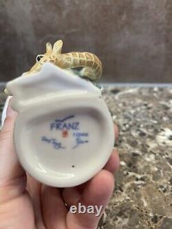 Franz porcelain giraffe tea cup & saucer, milk jug and giraffe set