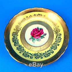 Heavy Gold Rose Center with Yolk Yellow Border Paragon Tea Cup and Saucer Set