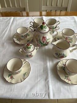 Pottery Luneville tea set with 8 cups and saucers in good condition