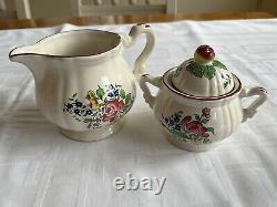 Pottery Luneville tea set with 8 cups and saucers in good condition