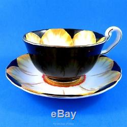 Rare Hand Painted Jonquil on Black Victoria Tea Cup and Saucer Set