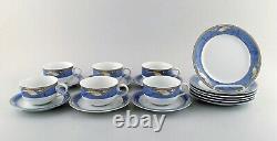 Royal Copenhagen. Set of six Magnolia tea cups with saucers and six plates