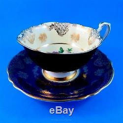 Striking Cobalt and Cream with Floral Center Paragon Tea Cup and Saucer Set