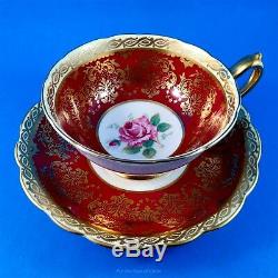 Very Ornate Deep Red with Pink Rose Center Paragon Tea Cup and Saucer Set