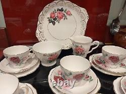 Very pretty mismatch china tea set for six with tea pot