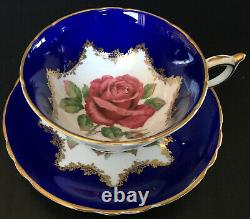 Vintage Paragon Cobalt Blue With Large Pink Floating Rose Tea Cup And Saucer Set